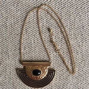 Gold colored chain pendant necklace